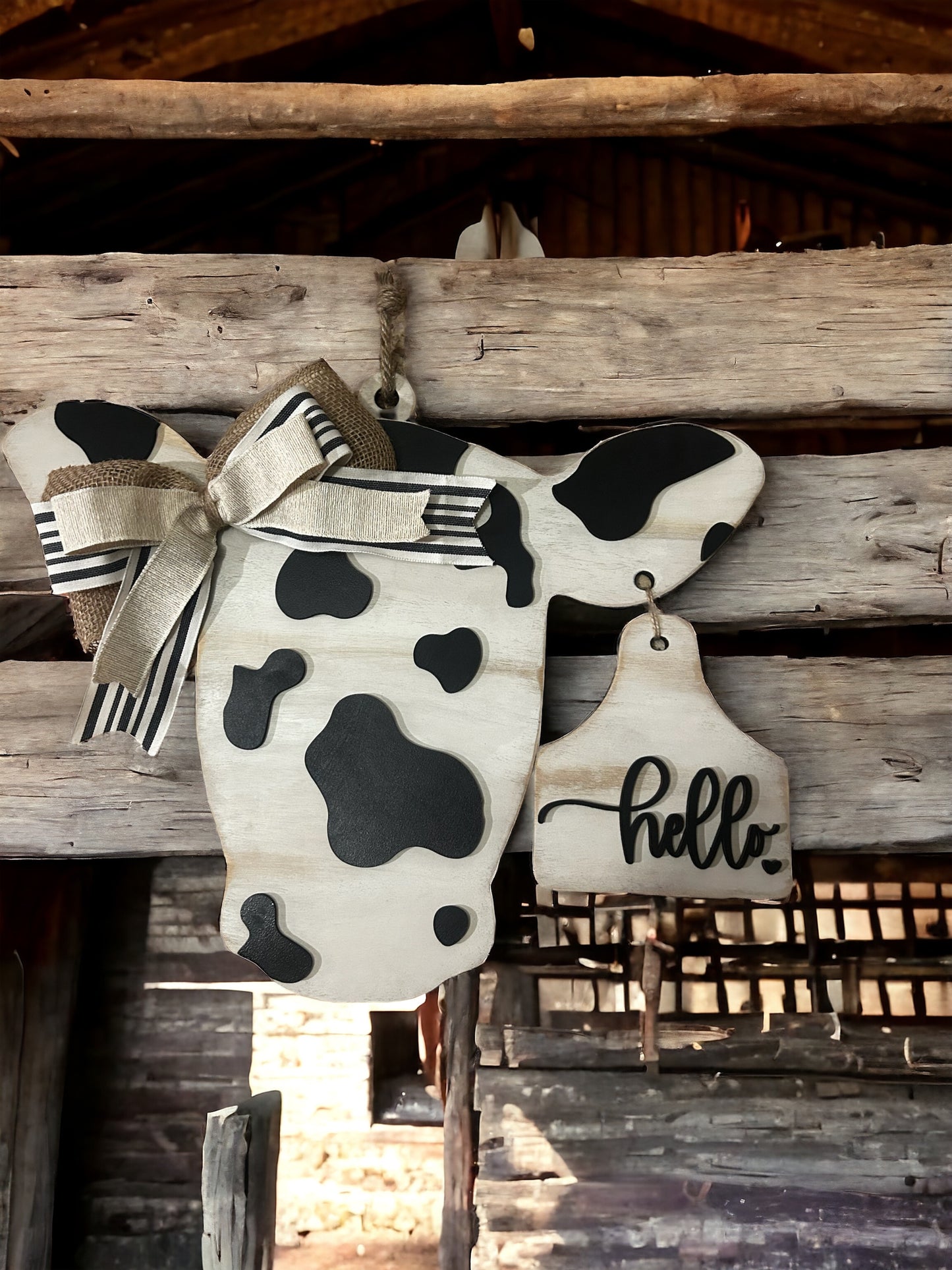 Cow door hanger with ear tag